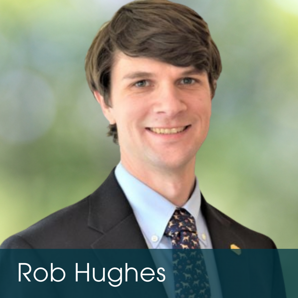 A man with brown hair wearing a dark suit jacket, light blue shirt, and patterned tie smiles at the camera. "Rob Hughes" appears in white text on a blue-green banner, highlighting his expertise in estate planning. The background is blurred and green.