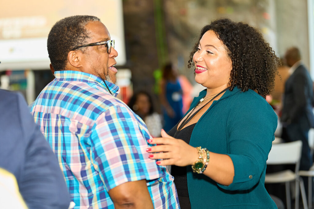 A man and woman talking.