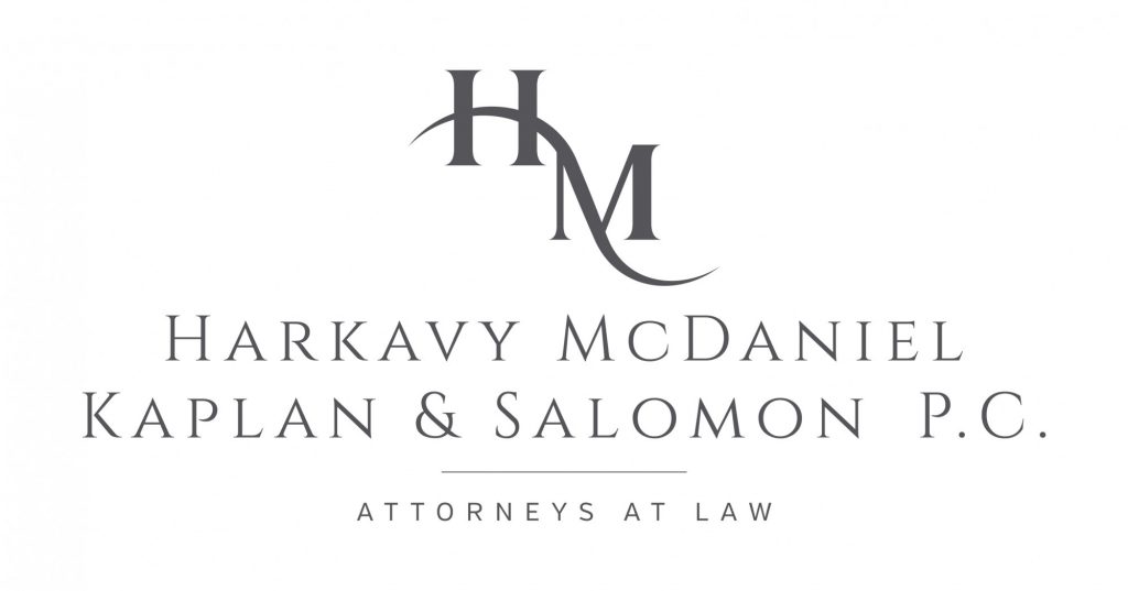 Logo for Harkavy McDaniel Kaplan & Salomon P.C., Attorneys at Law, featuring large HM initials above the firm’s full name in elegant, uppercase lettering, with Attorneys at Law below—serving the Mid-South and leaders in Planned Giving.